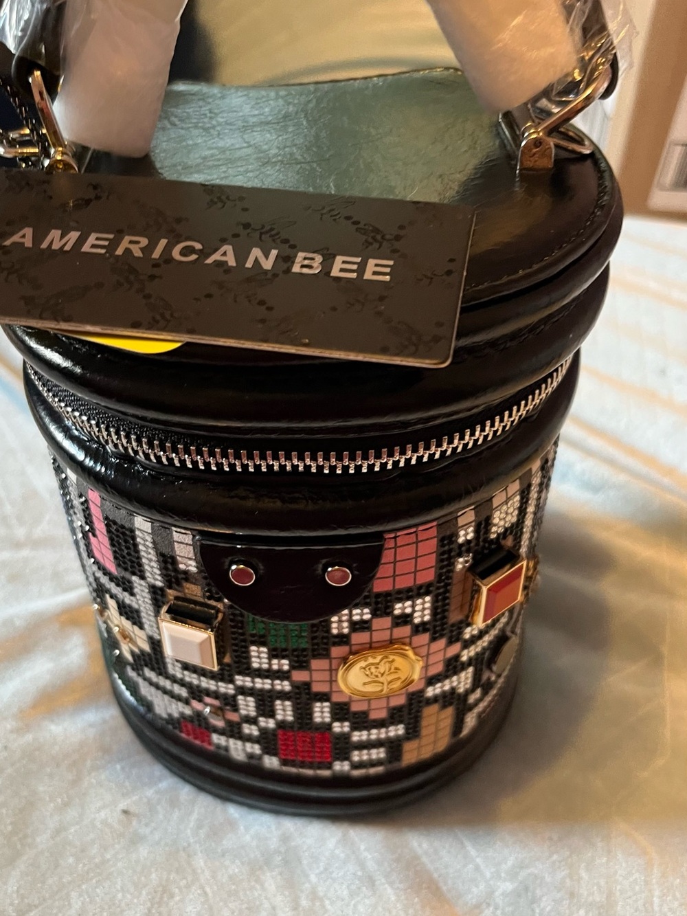 American Bee Black Cylinder Toiletry Bag with Mosaic Embellishments